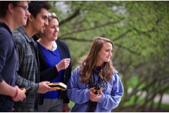 GIS majors getting hands-on GPS experience with a professor